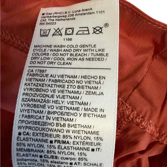 Athleta Rust-Red Terracotta Orange Ruffled High Neck Sleeveless Drawstring Tunic - Picture 5 of 7